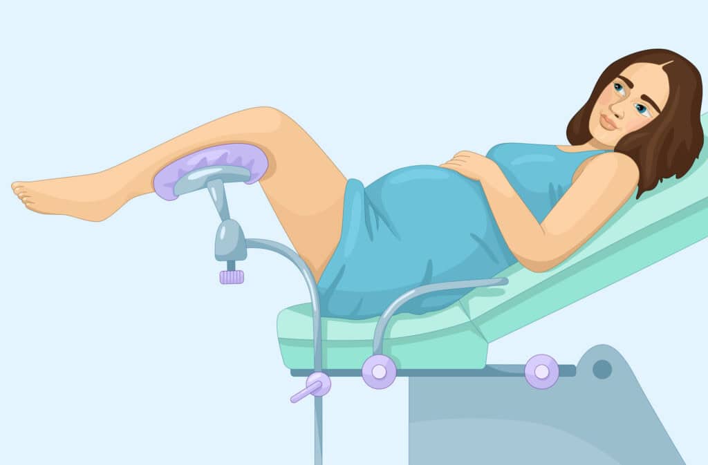 Pregnant woman on a medical exam table for a Pap smear.