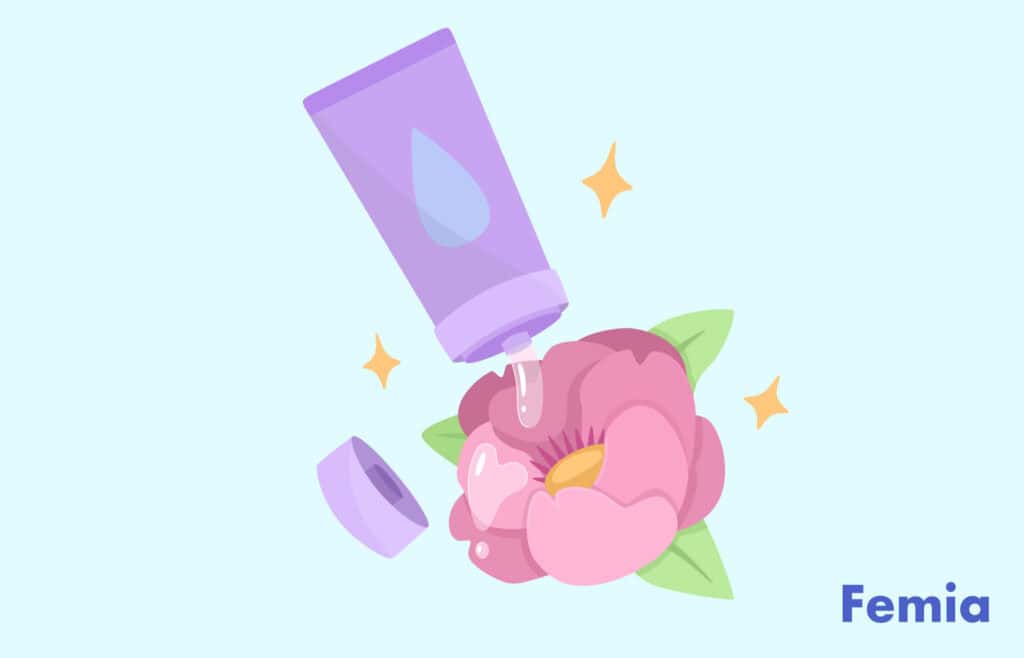 A tube of water-based lubricant being applied to a pink flower, symbolizing the use of lubrication to make first-time sex more comfortable.