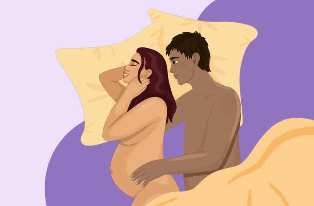 An illustration of a couple on a bed representing sex positions during pregnancy.