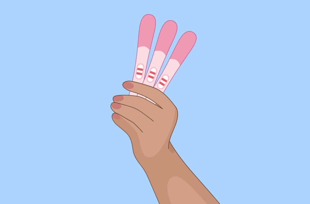 An illustration of a hand holding three positive pregnancy tests representing how to get pregnant fast Viewers of this file can see comments and suggestions.