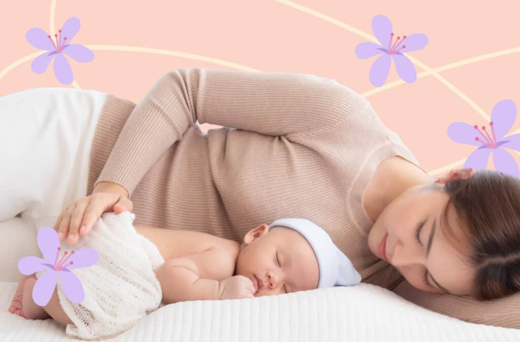 A photo of a new mom lying next to a newborn baby and following the 5-5-5 rule for postpartum recovery.