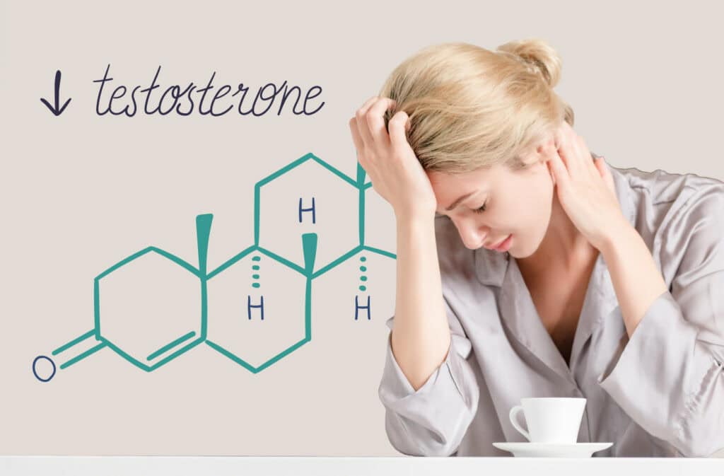 A photo of a drained woman experiencing symptoms of low testosterone in women, with a testosterone chemical formula in the back.