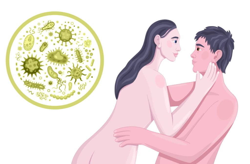 An illustration of a bunch of bacteria and a hugging couple wondering 'Can you have sex with a UTI?'