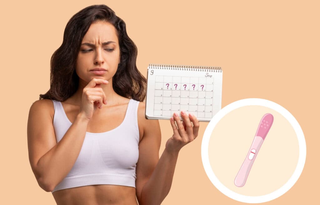 A photo of a woman holding a calendar, and a negative pregnancy test aside, representing a missed period not pregnant.